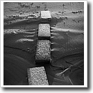 Bricks under snow, Joshua Ivey Abitz, 2003, 10 x 10 in. silver gelatin fiber based print